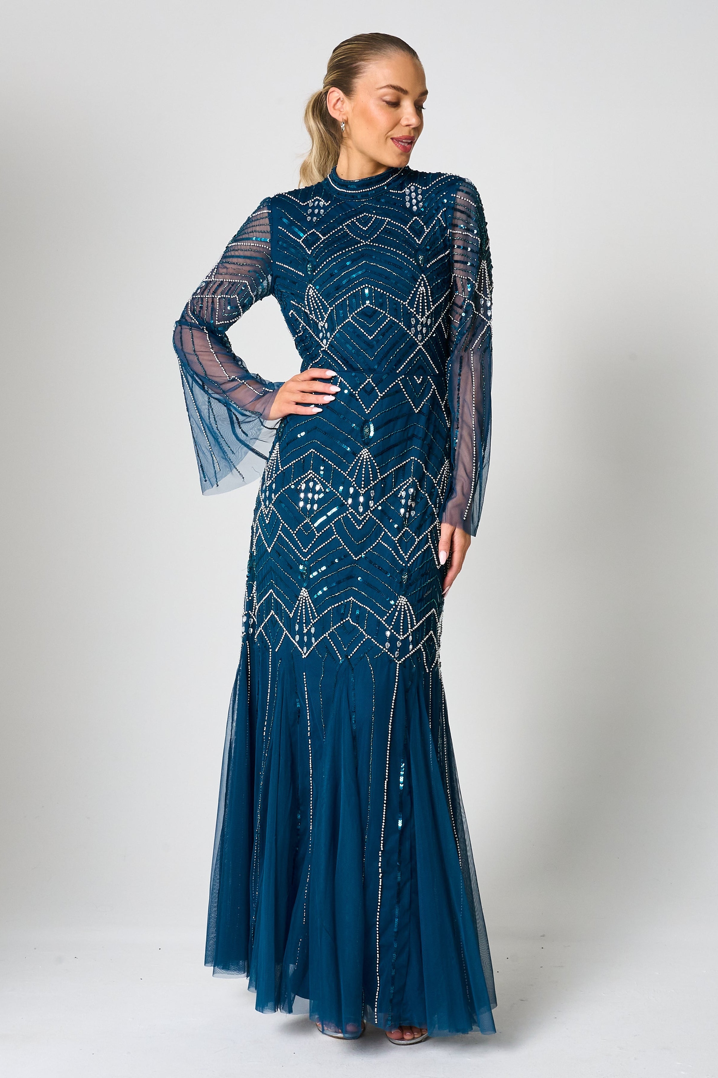 Adelia blue embellished maxi dress with vintage-inspired beadwork, high neckline and long sleeves designed for elegant modest occasion wear styling