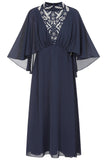 Alani navy embellished cape sleeve midi dress by Frock and Frill with high neckline, silver embellishment and flowing cape sleeves designed for elegant occasion wear styling