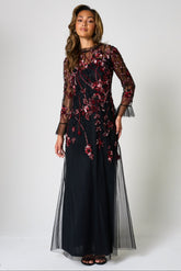 Aliza black floral embellished maxi dress by Frock and Frill with pink and red floral detailing, sheer mesh overlay and ruffle accents for elegant occasion wear styling