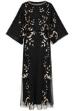 Black maxi dress with gold sequin floral embellishment, flowing sheer sleeves and full-length silhouette, Ambretta by Frock and Frill.