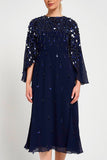 Annette navy embellished cape sleeve midi dress with tonal sequin detailing and flowing silhouette designed for elegant wedding guest and occasion wear styling