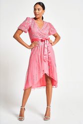 Cleo strawberry embellished wrap front dress with V neckline, satin waist tie and dip hem designed for weddings, race days and summer occasion wear styling