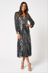 Hilda black sequin midi dress with faux wrap silhouette, V neckline and long sleeves designed for elegant evening and occasion wear styling