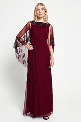 Jovena burgundy embellished cape sleeve maxi dress by Frock and Frill with tonal bead detailing and flowing silhouette designed for elegant occasion wear styling