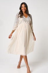 Kathryn nude sequin midi dress with embellished bodice and sleeves, V neckline and fit-and-flare silhouette designed for elegant occasion wear styling