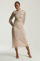 Leah blush sequin midi dress with high neckline, three-quarter sleeves and all-over sparkle designed for elegant evening and occasion wear styling