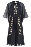Maeve navy floral embroidered midi dress by Frock and Frill with high neckline, flowing cape sleeves, and elegant silhouette.