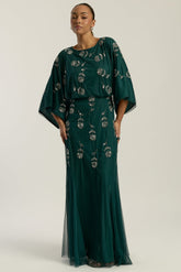 Naida rainforest green embellished maxi dress by Frock and Frill with batwing sleeves and silver floral beadwork designed for flowing statement occasion wear styling