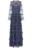 Nerissa dusty navy blue sequin tiered maxi dress with full-length sleeves, perfect for weddings, black tie balls and formal occasions.