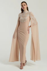 Penelope blush cape maxi dress with white embellishments on bodice and cape sleeves, modest formal dress for weddings and spring occasions