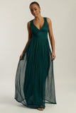 Green embellished maxi dress with flowing pleated skirt and detachable sheer cape overlay, featuring gold bead detailing and an elegant V-neck silhouette for occasion wear.