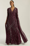 Simone fig sequin cape sleeve maxi dress with plunging V neckline, silver criss-cross sequin detailing and flowing full-length silhouette for statement occasion wear styling