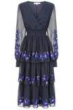 Frock & Frill Tamsin navy floral embroidered midi dress with tiered chiffon skirt, sheer long sleeves, and vibrant blue embroidered detailing—perfect for weddings and special occasions.