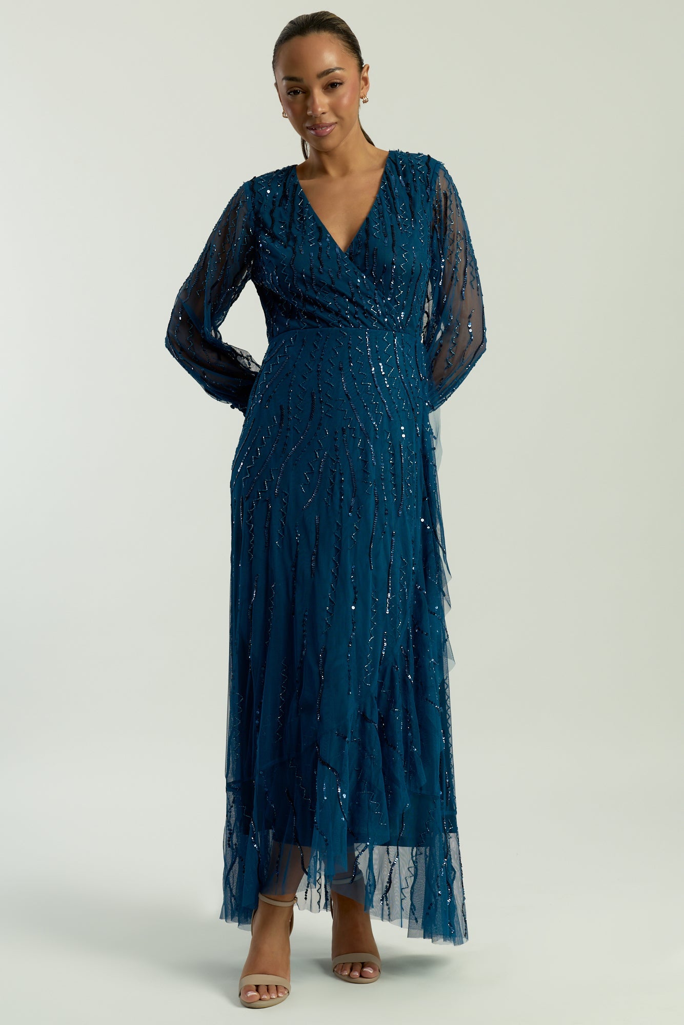 Velora skipper blue sequin midi dress with V-neckline, long sleeves, and fit-and-flare silhouette, perfect for evening events, weddings, and parties.