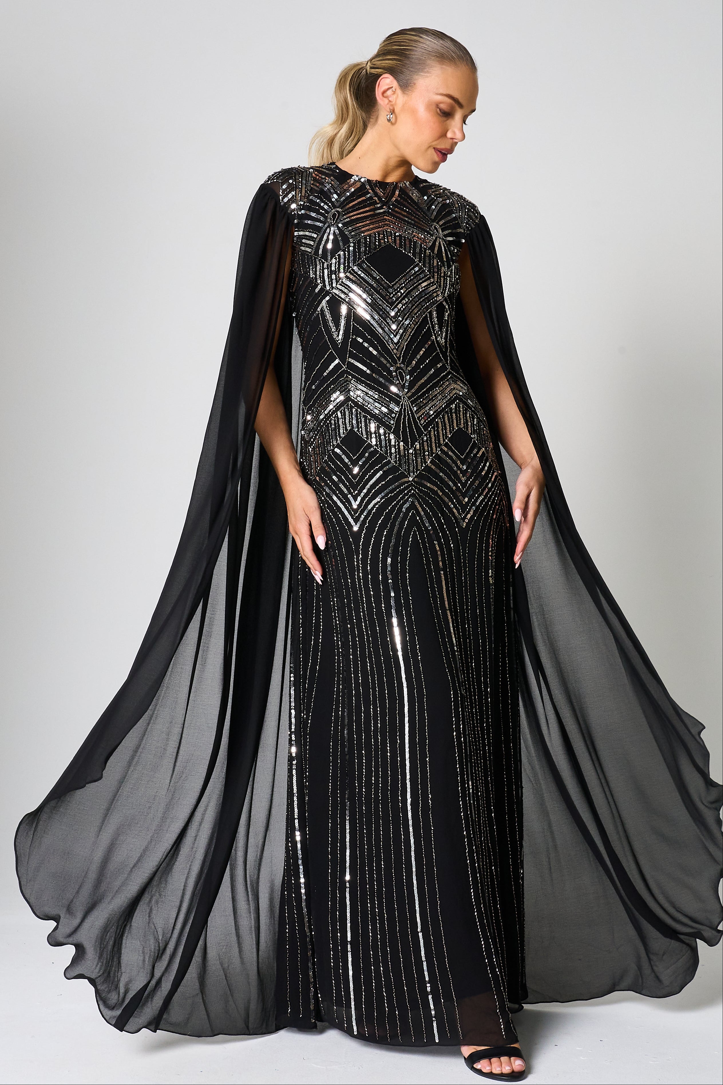 Verna black embellished cape sleeve maxi dress for evening and formal occasions