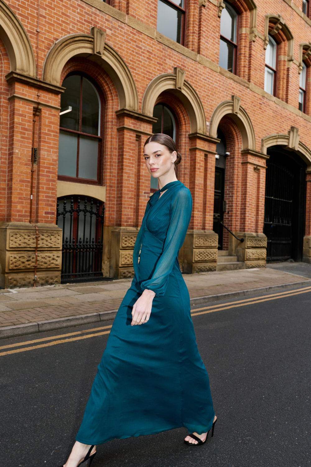 Elaine storm green tie neck maxi dress with long sleeves and floor-length silhouette designed for elegant wedding guest and occasion wear styling