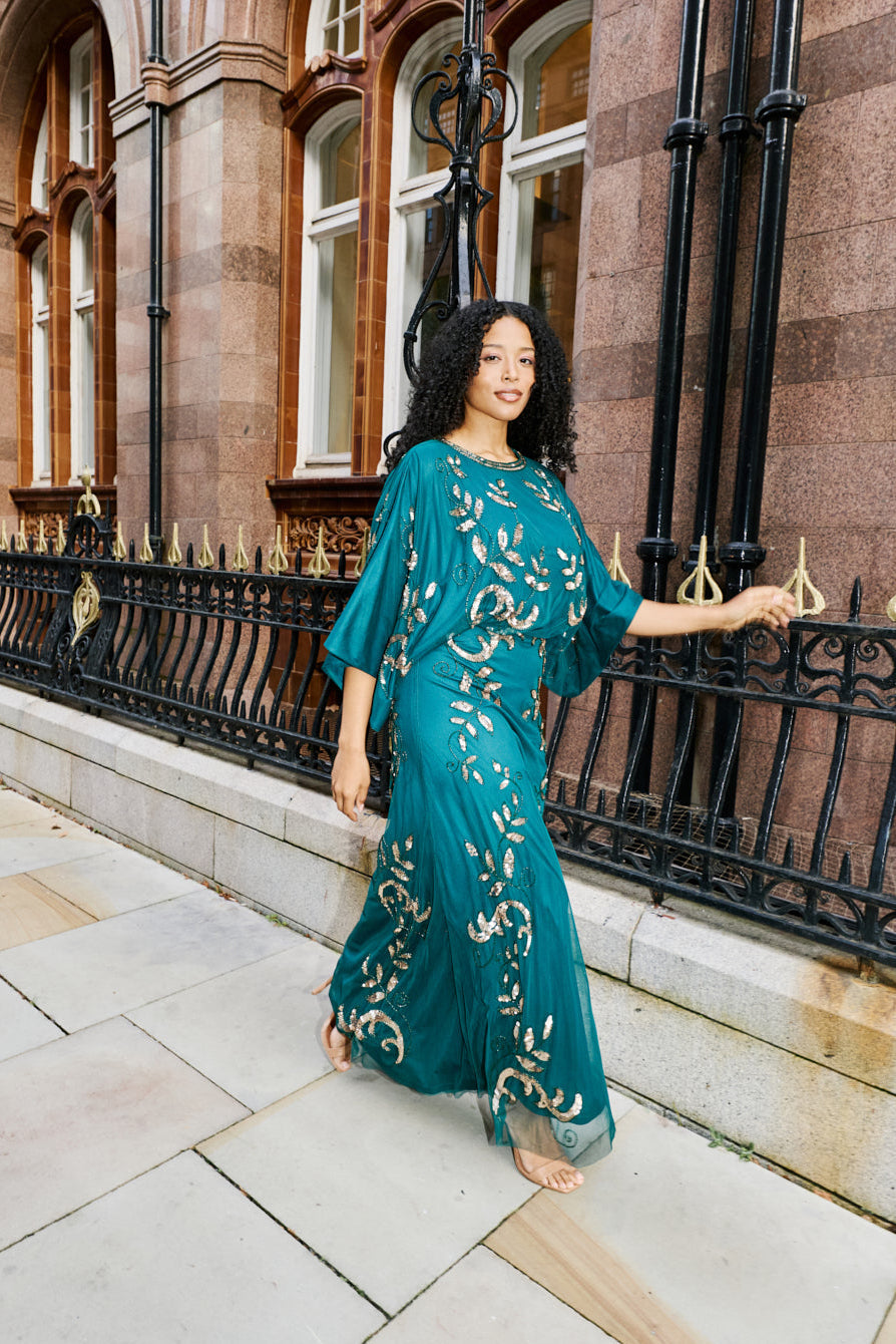 Frock and Frill Ambretta Embellished Midi Dress with elbow-length sleeves in rainforest green, featuring sparkling beadwork and a flowing elegant silhouette.