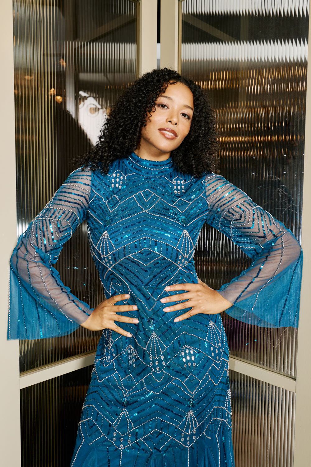 Adelia blue embellished maxi dress with vintage-inspired beadwork, high neckline and long sleeves designed for elegant modest occasion wear styling