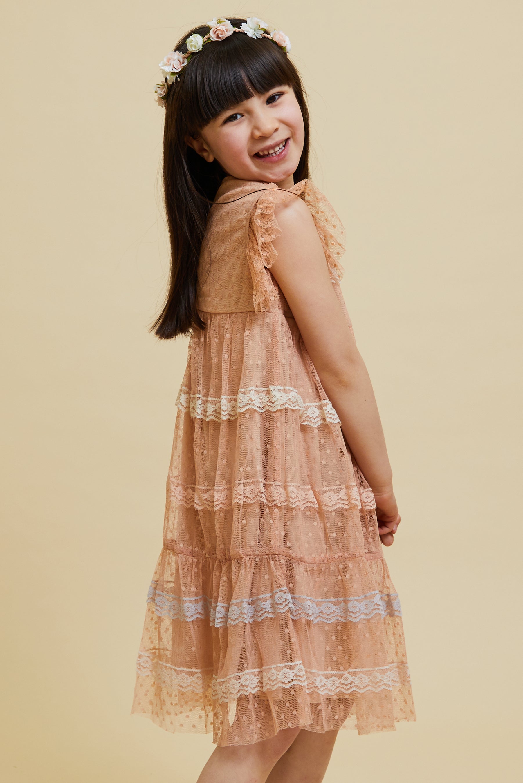 Corabelle pink ruffled lace dress with pastel lace trim and polka dot mesh overlay designed for children’s occasion wear and special events 