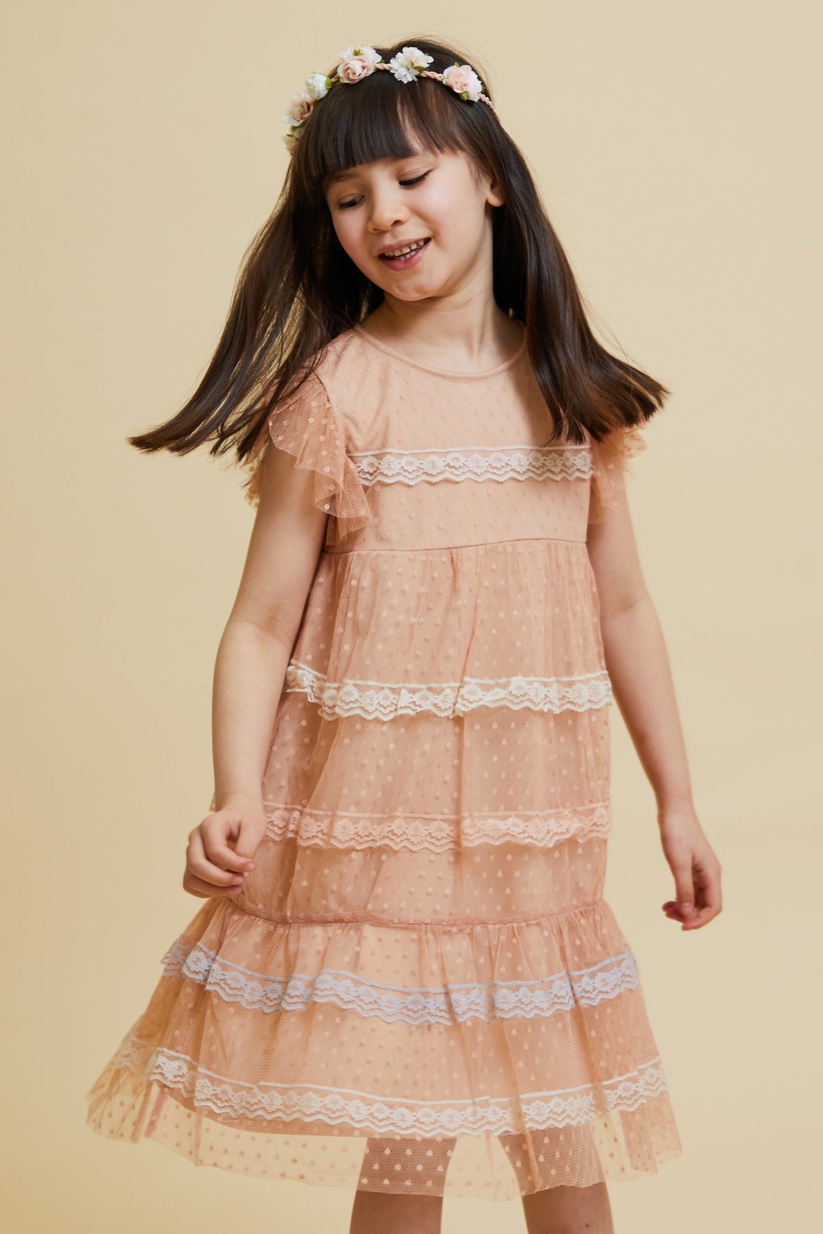 Corabelle pink ruffled lace dress with pastel lace trim and polka dot mesh overlay designed for children’s occasion wear and special events styling