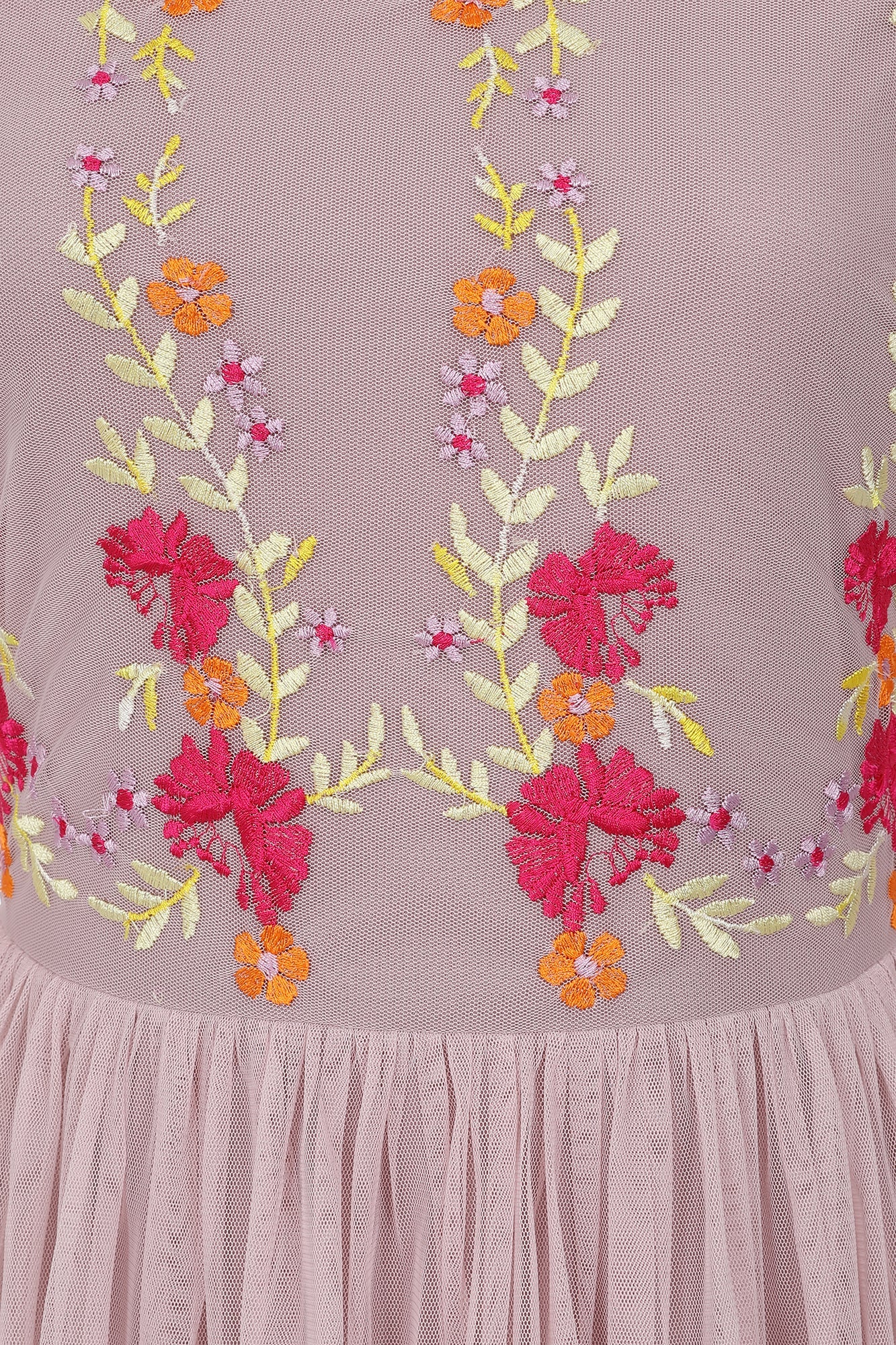 Abelia blush floral embroidered maxi dress by Frock and Frill with long sleeves and flowing silhouette designed for romantic wedding guest and occasion wear styling