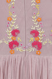 Abelia blush floral embroidered maxi dress by Frock and Frill with long sleeves and flowing silhouette designed for romantic wedding guest and occasion wear styling