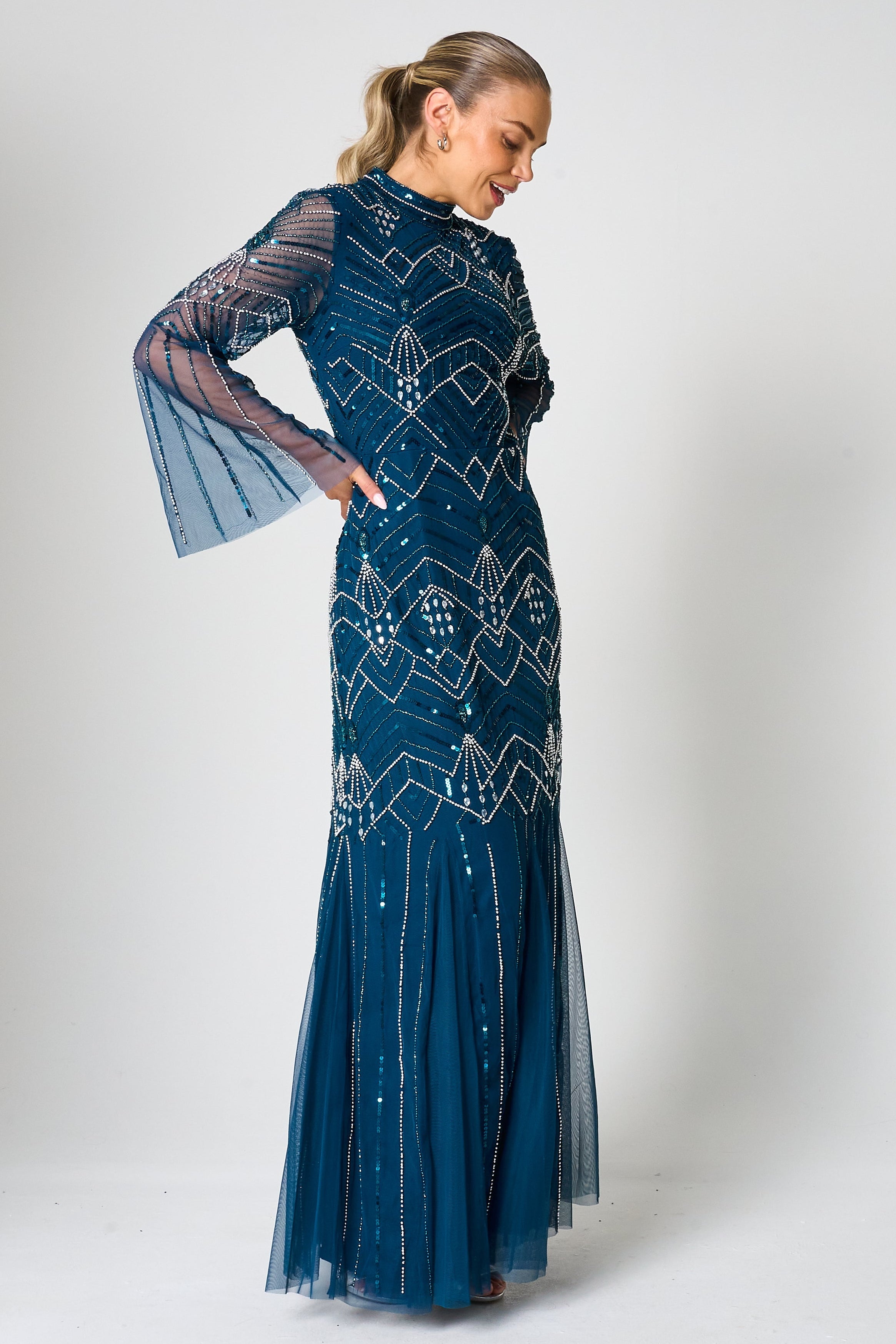Adelia blue embellished maxi dress with vintage-inspired beadwork, high neckline and long sleeves designed for elegant modest occasion wear styling
