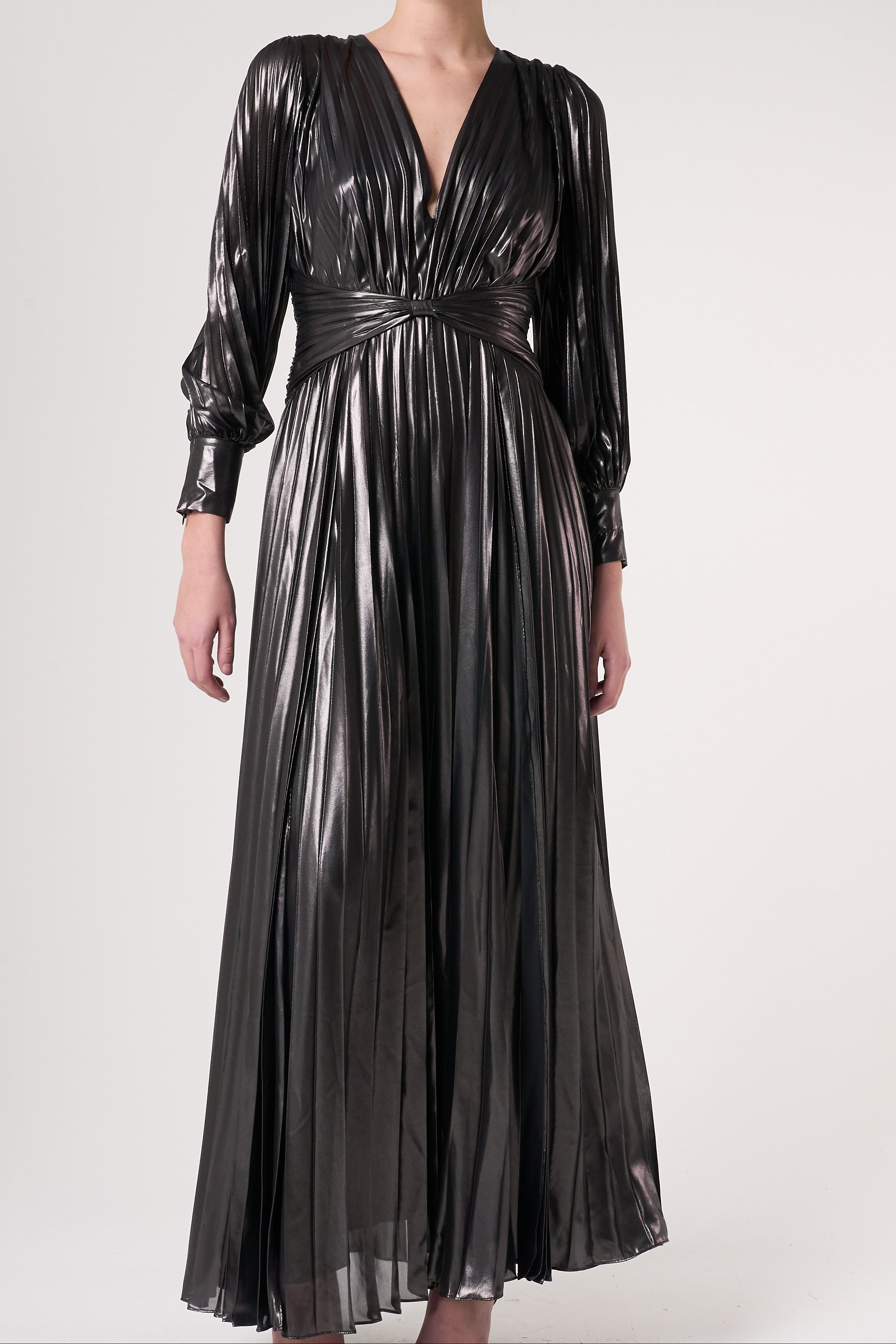 Alberta metallic charcoal pleated maxi dress with V neckline, blouson sleeves and waist twist detail designed for elegant evening and occasion wear styling