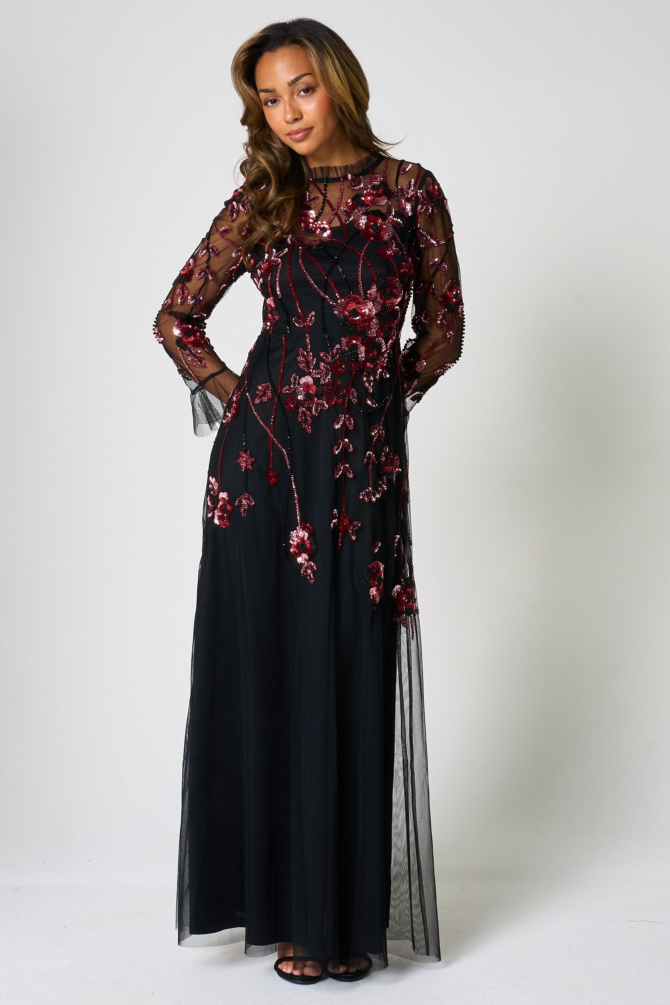 Aliza black floral embellished maxi dress by Frock and Frill with pink and red floral detailing, sheer mesh overlay and ruffle accents for elegant occasion wear styling