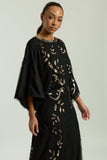 Black maxi dress with gold sequin floral embellishment, flowing sheer sleeves and full-length silhouette, Ambretta by Frock and Frill.