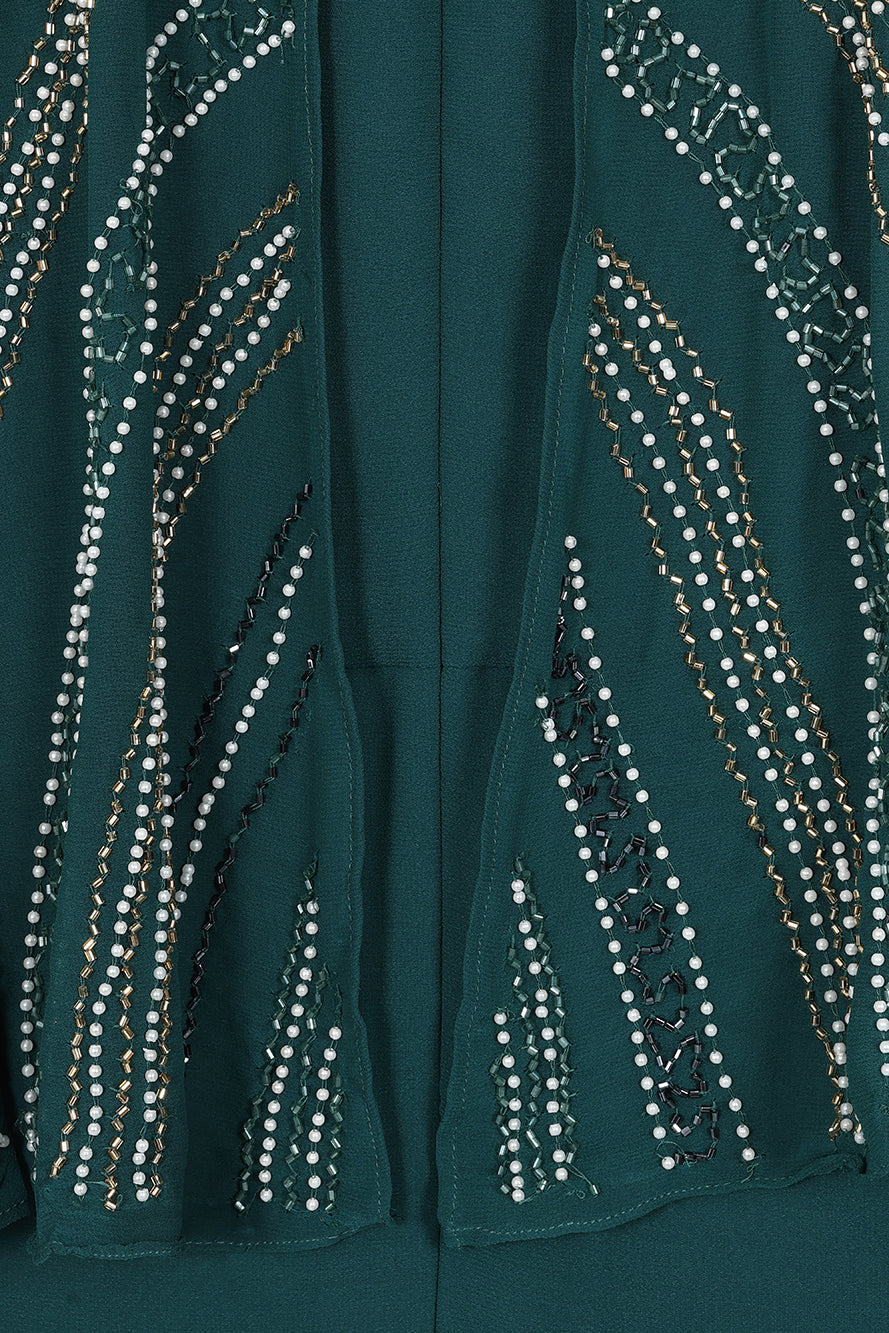 Anna storm green embellished midaxi dress with cape overlay and beadwork detailing designed for elegant wedding guest and occasion wear styling