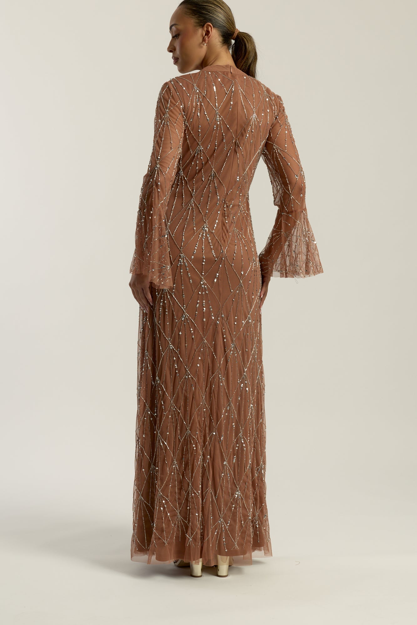 Aurielle Flared Sleeve Sequin Maxi Dress by Amelia Rose – modest long-sleeved maxi gown with delicate sequin embellishments, perfect for weddings and evening events