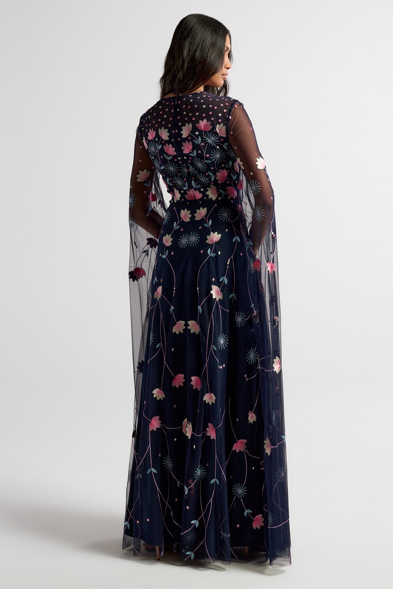 Azalea Navy Floral Cape Sleeve Maxi Dress by Frock and Frill with embroidered floral detail, flowing cape sleeves and modest evening design.