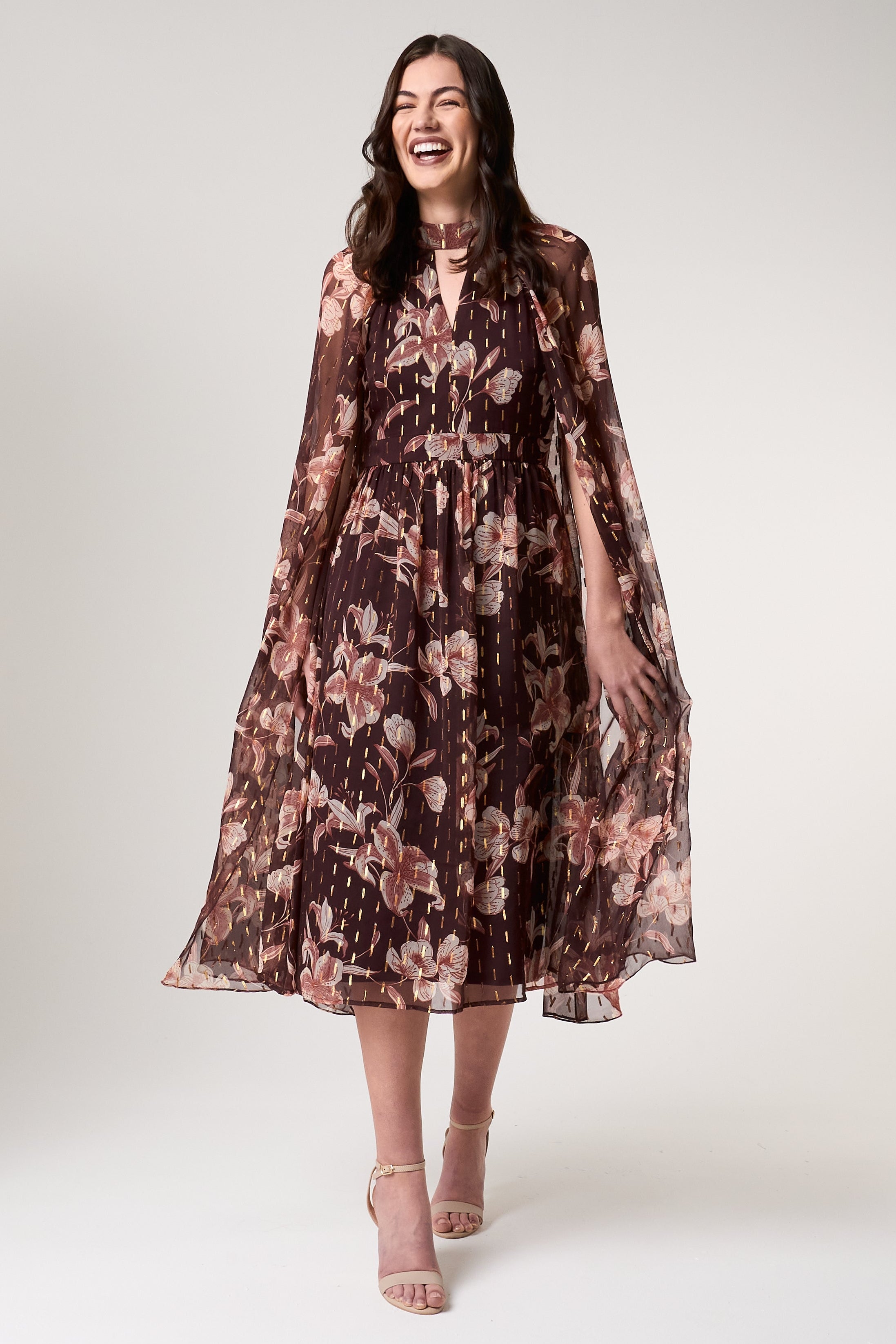 Bronwyn brown floral print cape sleeve midi dress by Frock and Frill with gold thread flecked detailing designed for elegant occasion and day to evening wear styling