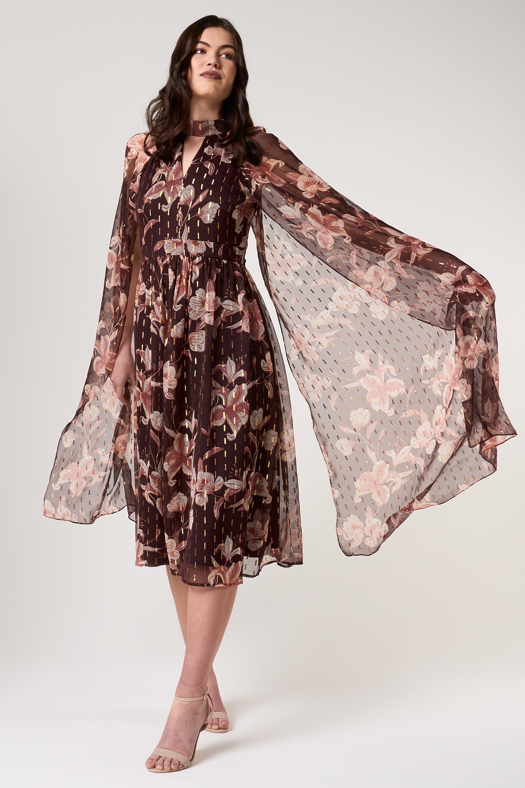 Bronwyn brown floral print cape sleeve midi dress by Frock and Frill with gold thread flecked detailing designed for elegant occasion and day to evening wear styling