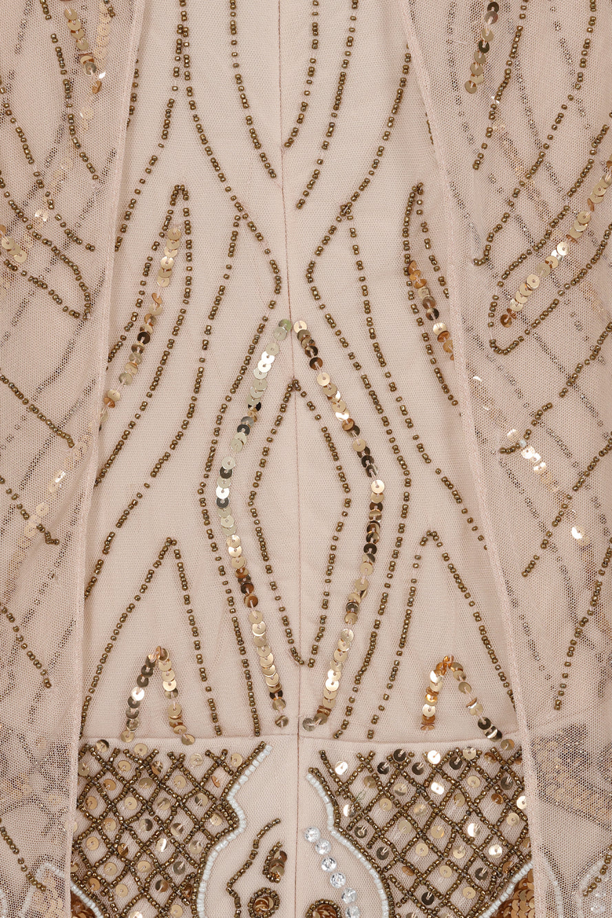 Celestine neutral-hued gold embellished maxi dress with flowing cape overlay, long sleeves, and modest elegant silhouette for weddings and formal occasions.