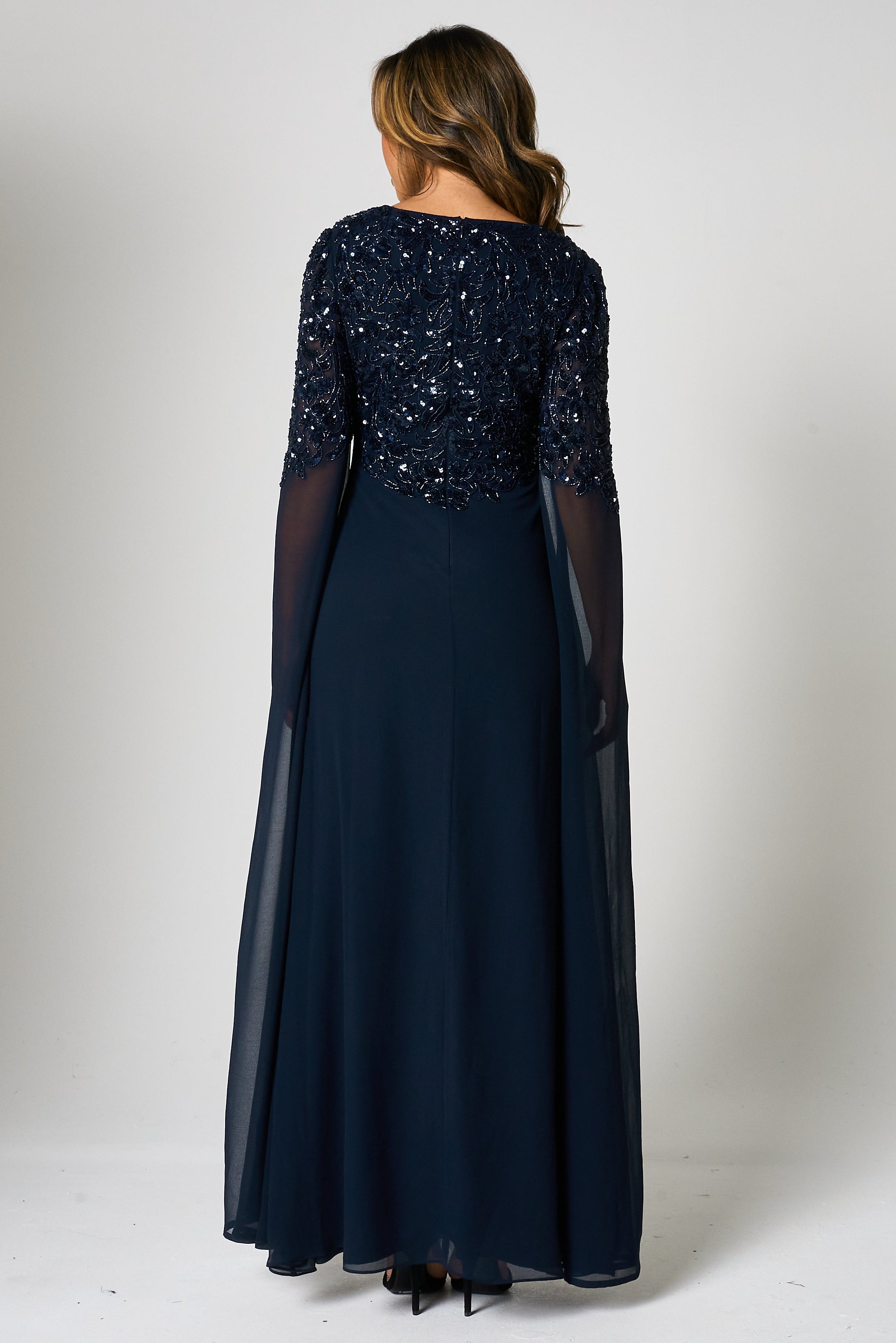 Cherith navy embellished cape sleeve maxi dress by Frock and Frill with square neckline, cascading bodice embellishment and full-length silhouette for elegant occasion wear styling