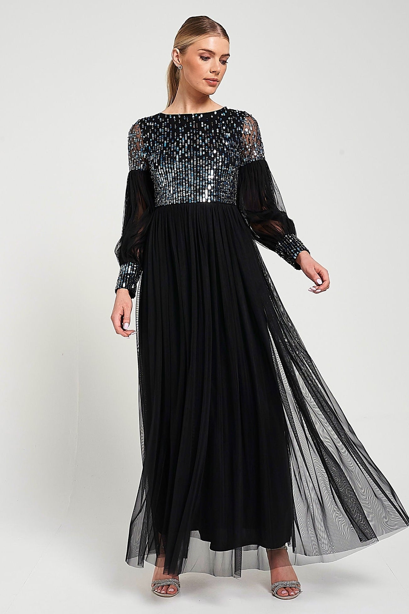 Dariane black sequin maxi dress with embellished bodice, long sleeves and full-length silhouette designed for elegant evening and occasion wear