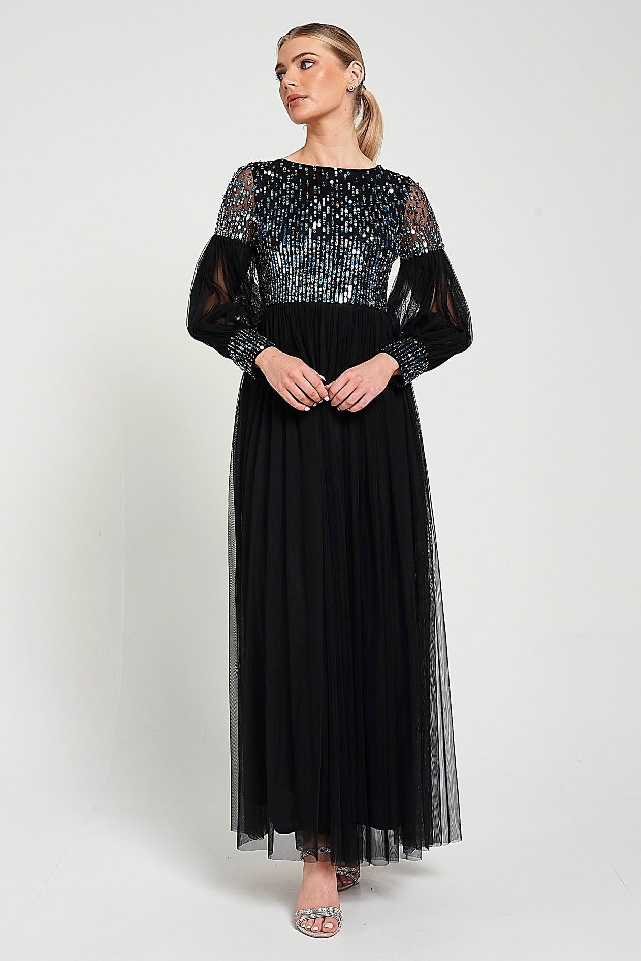 Dariane black sequin maxi dress with embellished bodice, long sleeves and full-length silhouette designed for elegant evening and occasion wear