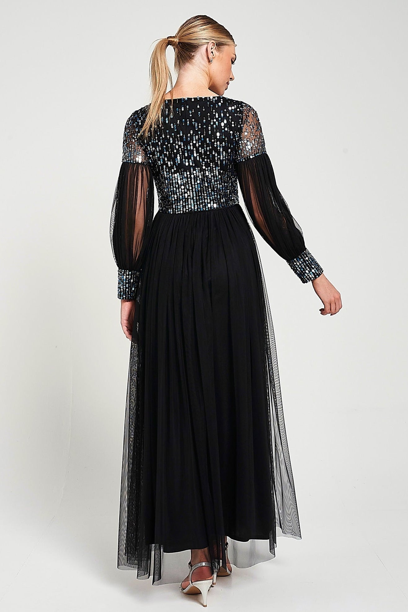 Dariane black sequin maxi dress with embellished bodice, long sleeves and full-length silhouette designed for elegant evening and occasion wear