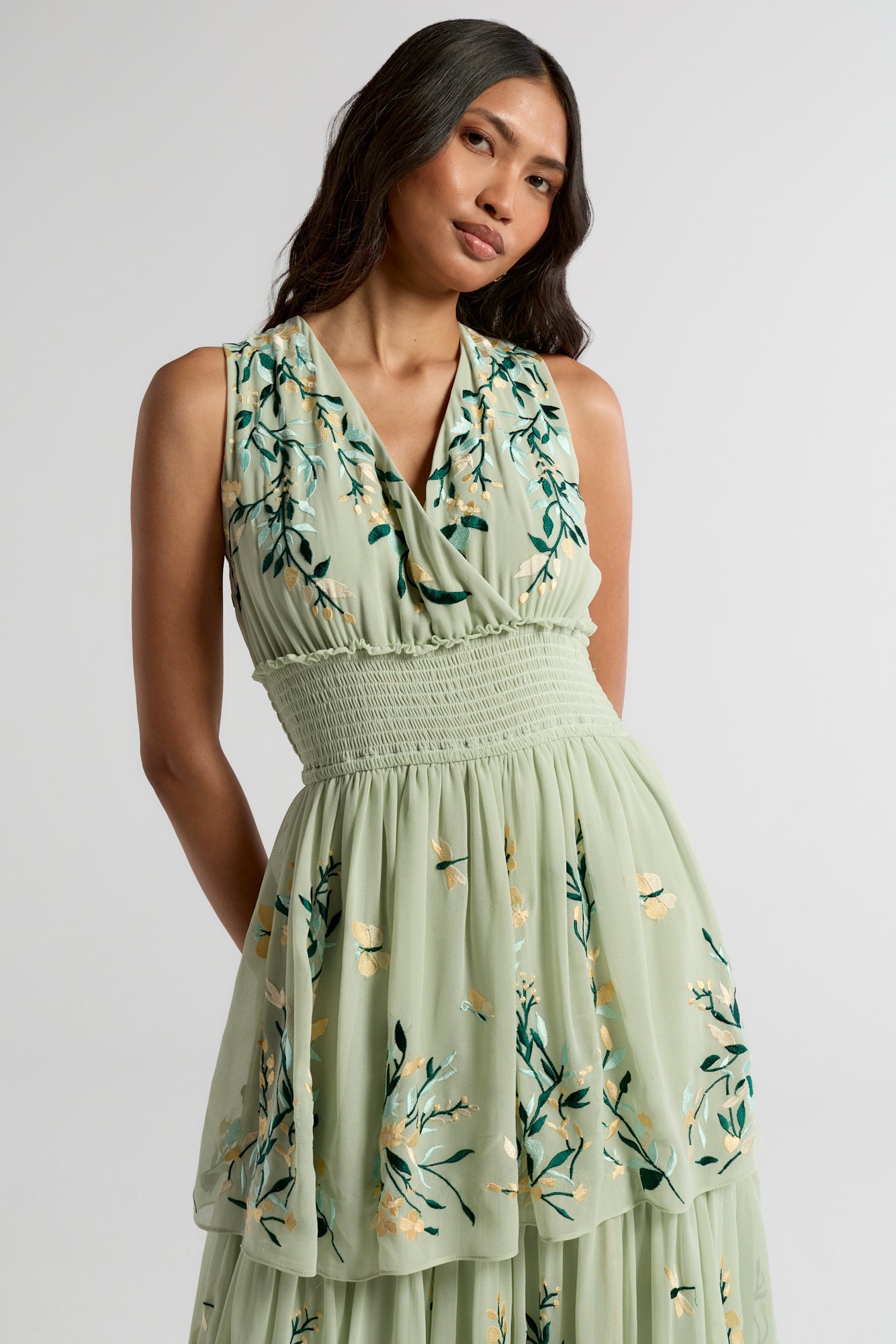 Delilah green floral embroidered tiered maxi dress with shirred waist by Frock and Frill, perfect for weddings, race days, and garden parties.