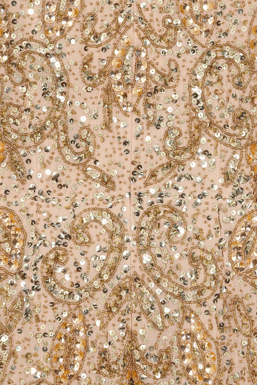 Donna gold embellished maxi dress with flowing cape sleeves, intricate beaded bodice and scattered sequins cascading to the hem.