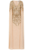 Donna gold embellished maxi dress with flowing cape sleeves, intricate beaded bodice and scattered sequins cascading to the hem.
