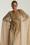 Donna gold embellished maxi dress with flowing cape sleeves, intricate beaded bodice and scattered sequins cascading to the hem.