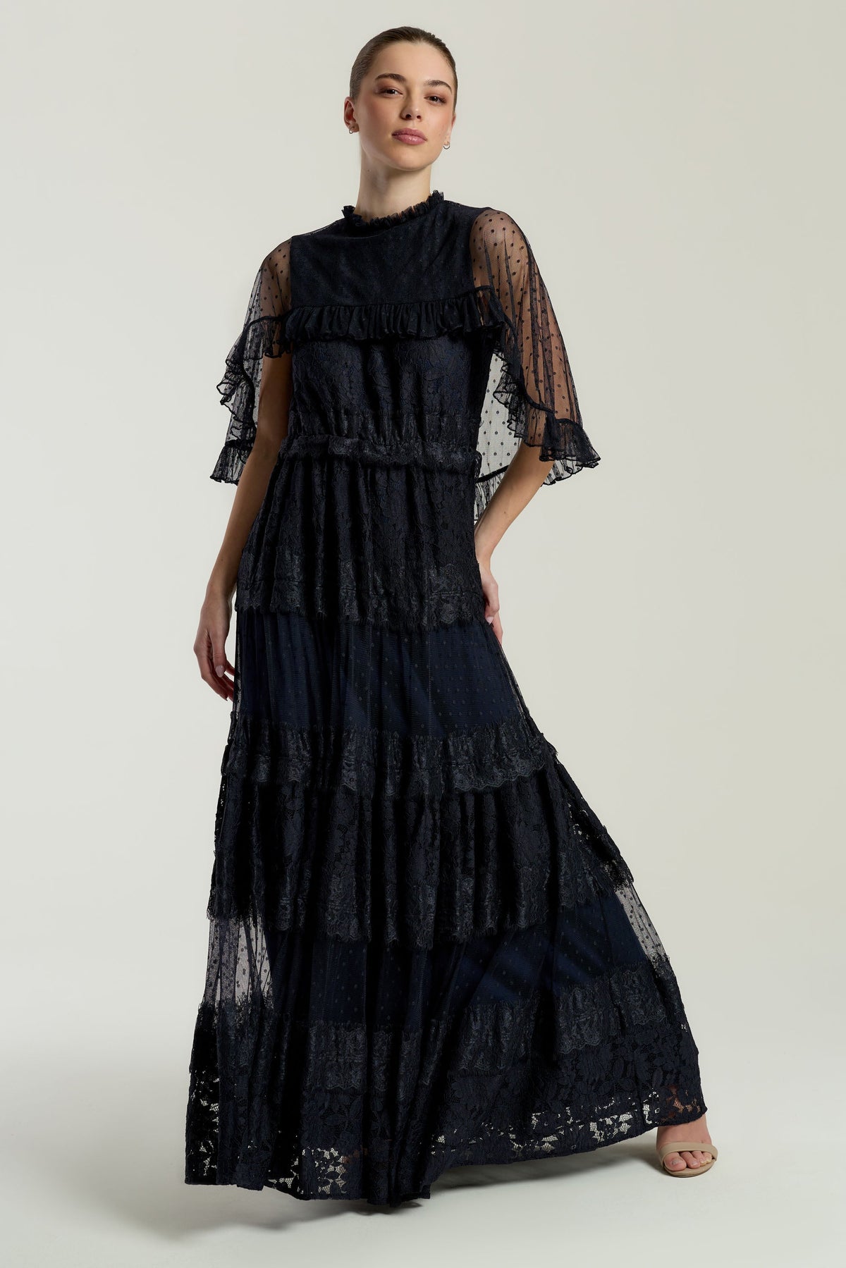 Edith Navy Lace Maxi Dress with Cape Detail by Frock and Frill, floor-length navy dress with lace overlay and flowing cape sleeves, ideal for weddings and parties