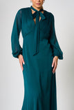 Elaine storm green tie neck maxi dress with long sleeves and floor-length silhouette designed for elegant wedding guest and occasion wear styling