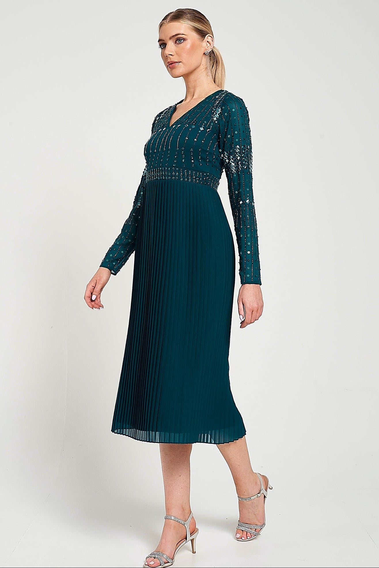 Elzina storm green embellished midi dress with V neckline, long sleeves, embellished bodice and pleated skirt designed for elegant occasion wear styling