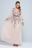 Erica Blush Floral Embroidered Maxi Dress by Frock and Frill, featuring long sleeves, V-neckline, and flowing maxi skirt in soft blush tones.