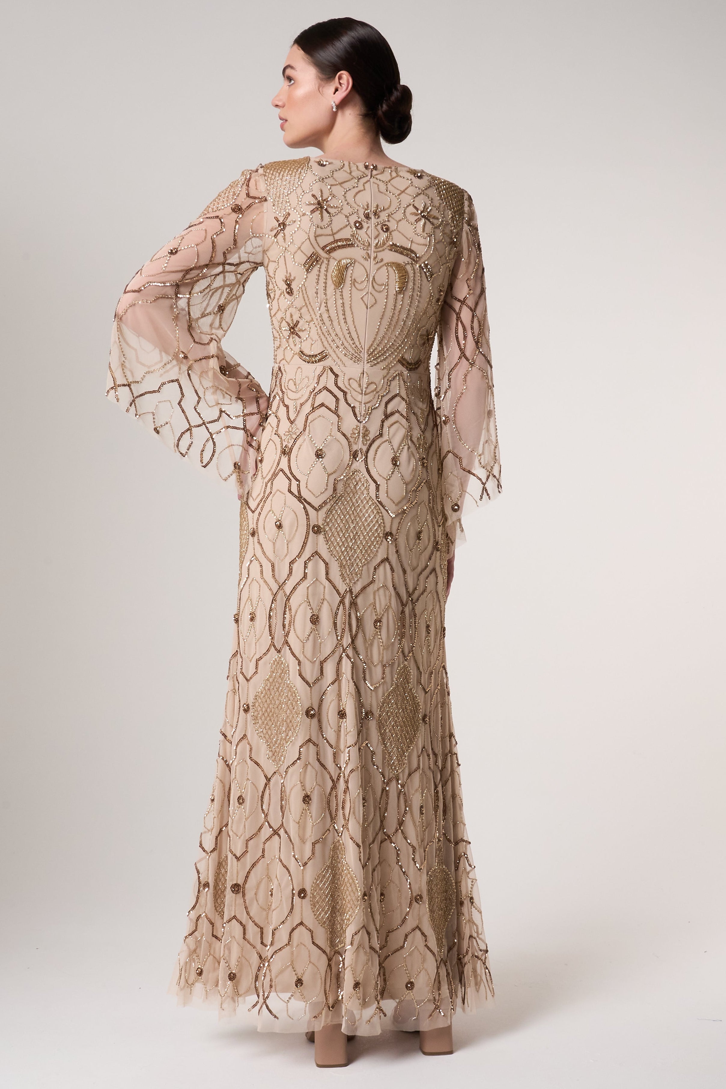 Faith gold embellished maxi dress with intricate beadwork and sheer long sleeves