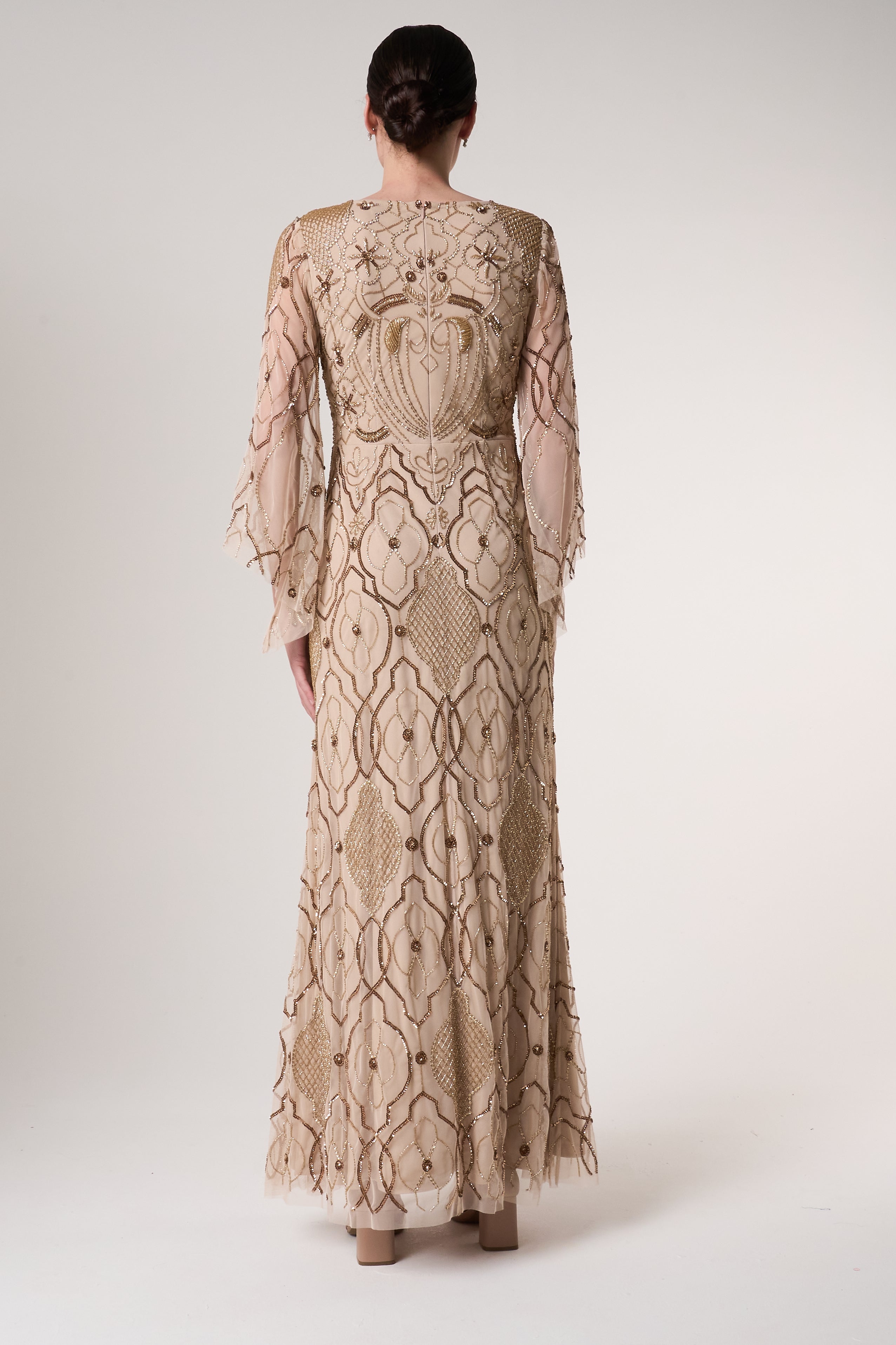 Faith gold embellished maxi dress with intricate beadwork and sheer long sleeves